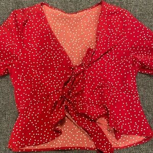 red polka dot top